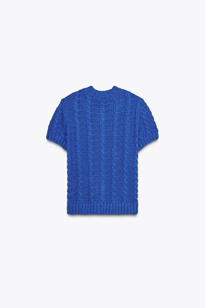 GILET EN MAILLE À MANCHES COURTES