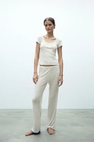 PANTALON EN MAILLE POINTELLE