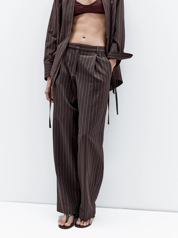 Pantalon à pinces et rayures tennis