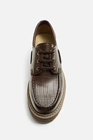 EMBOSSED BOAT SHOES