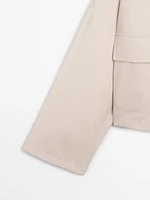 Veste cape déperlante