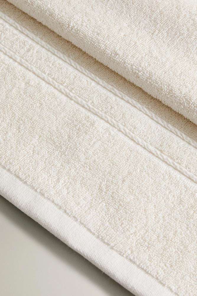 BATH TOWEL WITH BORDER