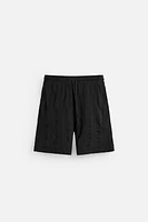 TEXTURED JOGGER SHORTS