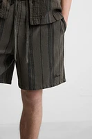 TEXTURED EMBROIDERED SHORTS