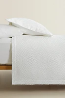 COTTON BEDSPREAD WITH A GEOMETRIC DESIGN