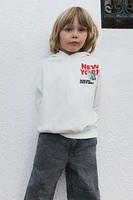 SWEAT À CAPUCHE IMPRIM