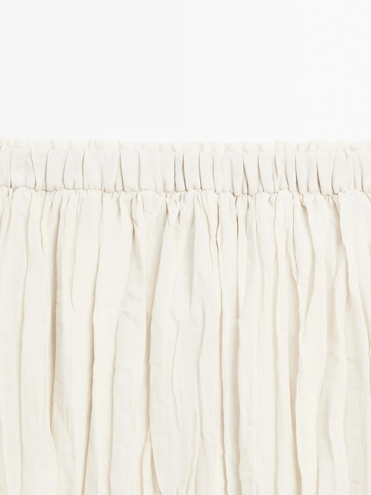 Flared pleated midi skirt