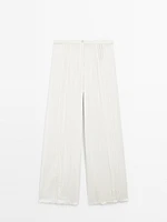 Cotton blend trousers with embroidered details