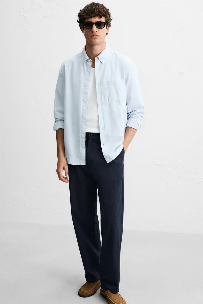 PANTALON REGULAR FIT À PLIS