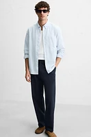 PANTALON REGULAR FIT À PLIS