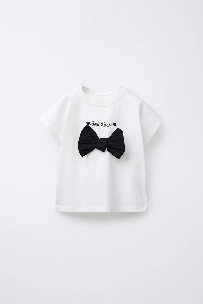 EMBROIDERED TEXT AND BOW T-SHIRT