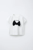 EMBROIDERED TEXT AND BOW T-SHIRT