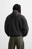 SWEAT DÉLAVÉ À COL ZIPPÉ