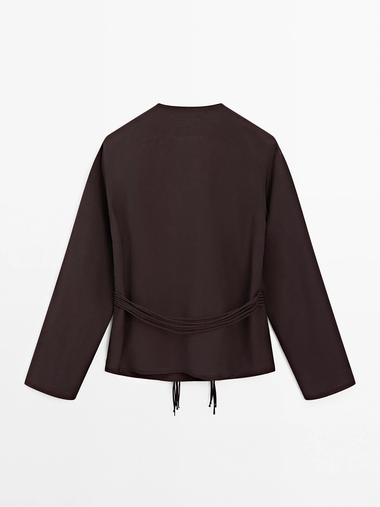 Flowing shirt with cord details