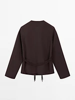 Flowing shirt with cord details