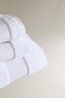 METALLIC THREAD BATH TOWEL WITH BORDER