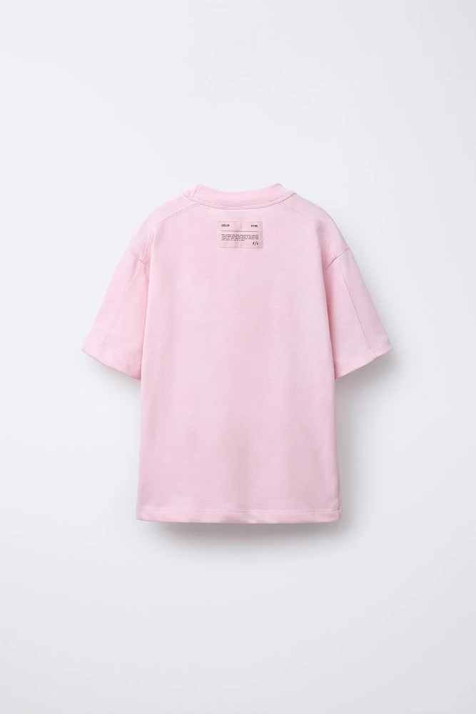 T-SHIRT UNI À ÉTIQUETTE
