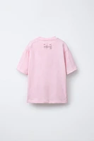 T-SHIRT UNI À ÉTIQUETTE