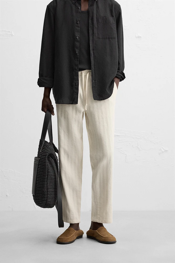 PANTALON EN JACQUARD À RAYURES