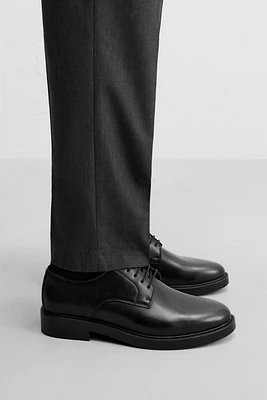 CHAUSSURES HABILLÉES