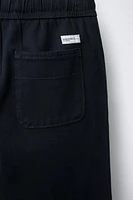 TEXTURED STRETCH PANTS