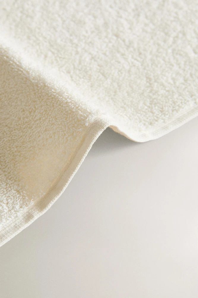 SERVIETTE DE BAIN BORDURE SURPIQÛRES