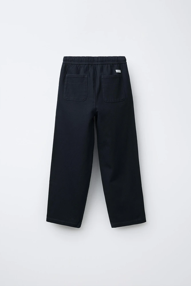 TEXTURED STRETCH PANTS