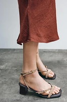 SANDALES À TALONS ET BRIDES EN CROÛTE DE CUIR