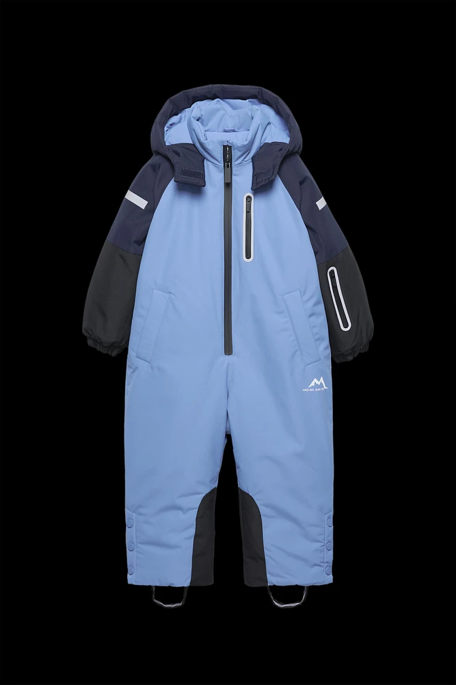COMBINAISON À CAPUCHE DÉPERLANTE ET COUPE-VENT COLLECTION SKI