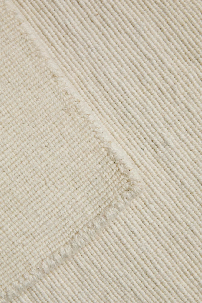 SMALL WOOL AREA RUG WITH WAVY LINES