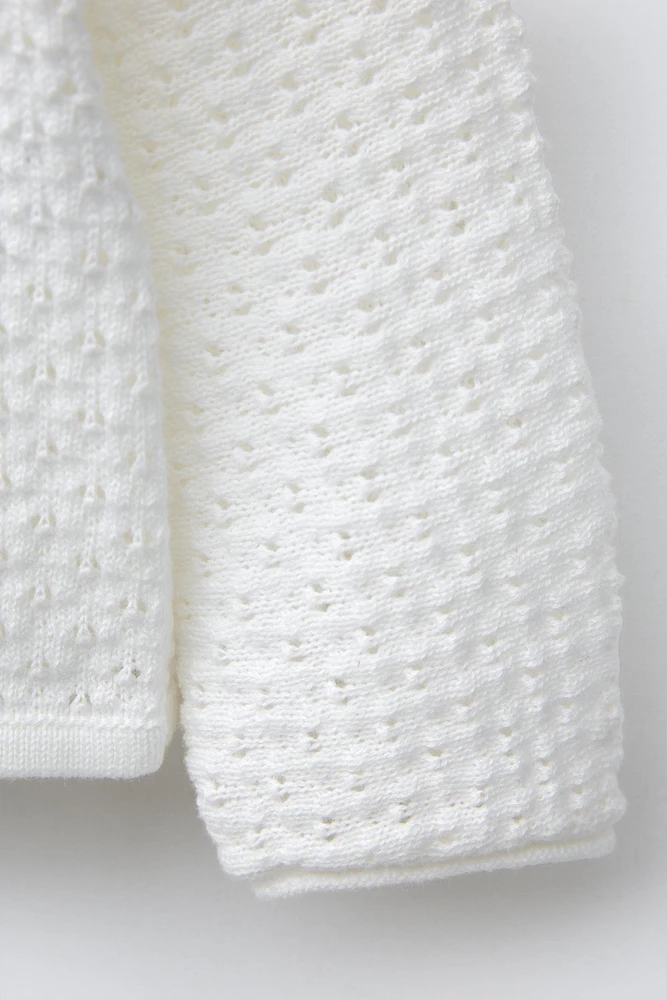 OPEN KNIT SWEATER