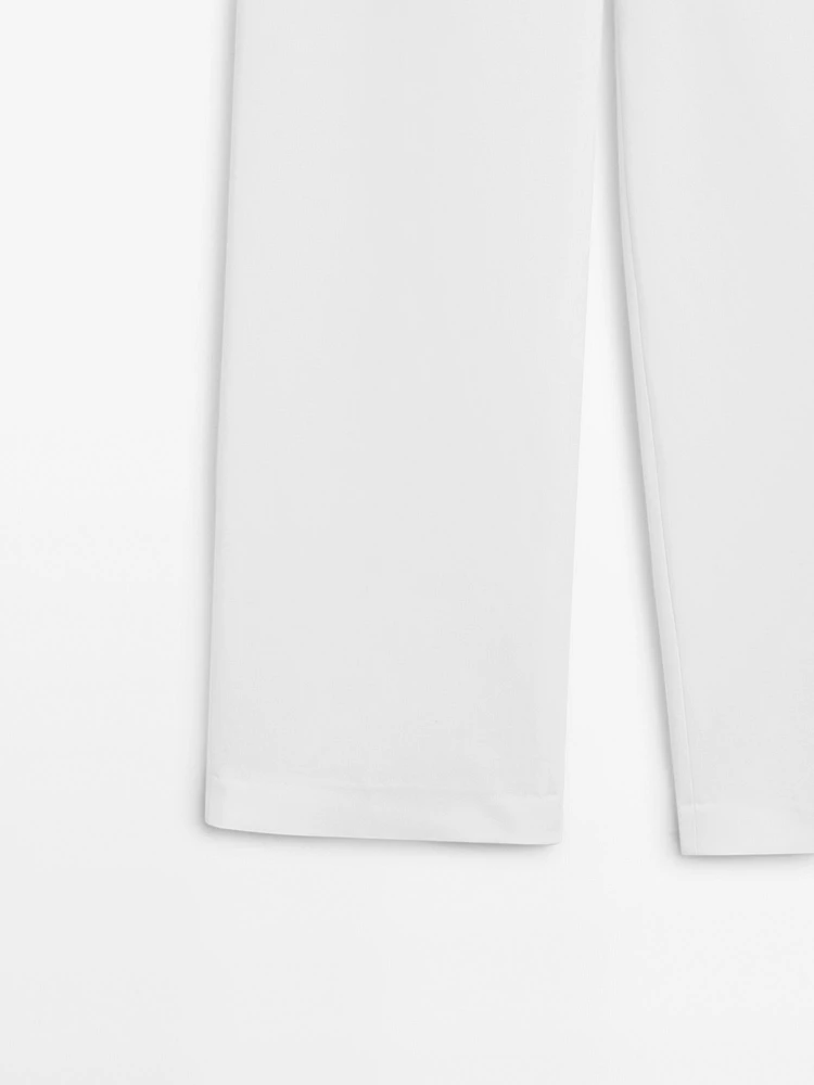 Straight-fit trousers with buckle detail