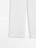 Straight-fit trousers with buckle detail