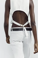 GILET AJOURÉ AU DOS