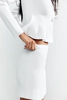 GILET PEPLUM EN MAILLE FINE