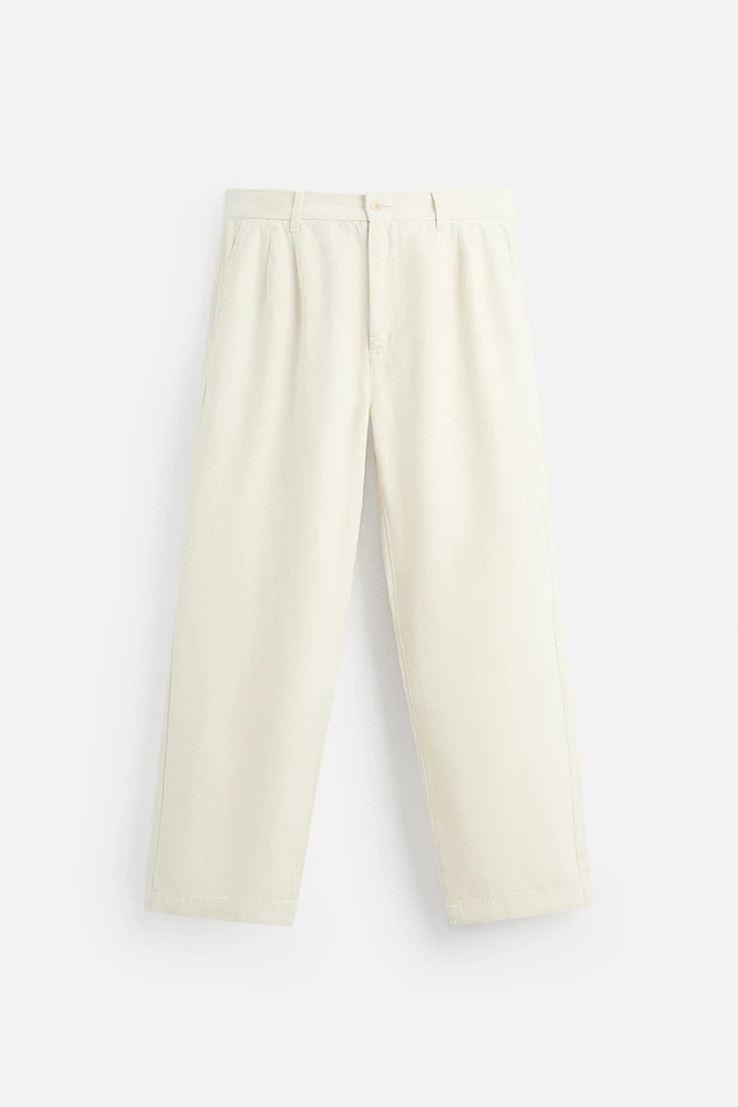 RELAXED FIT PLEATED PANTS