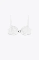 CONTRAST TIE RUFFLE BIKINI TOP