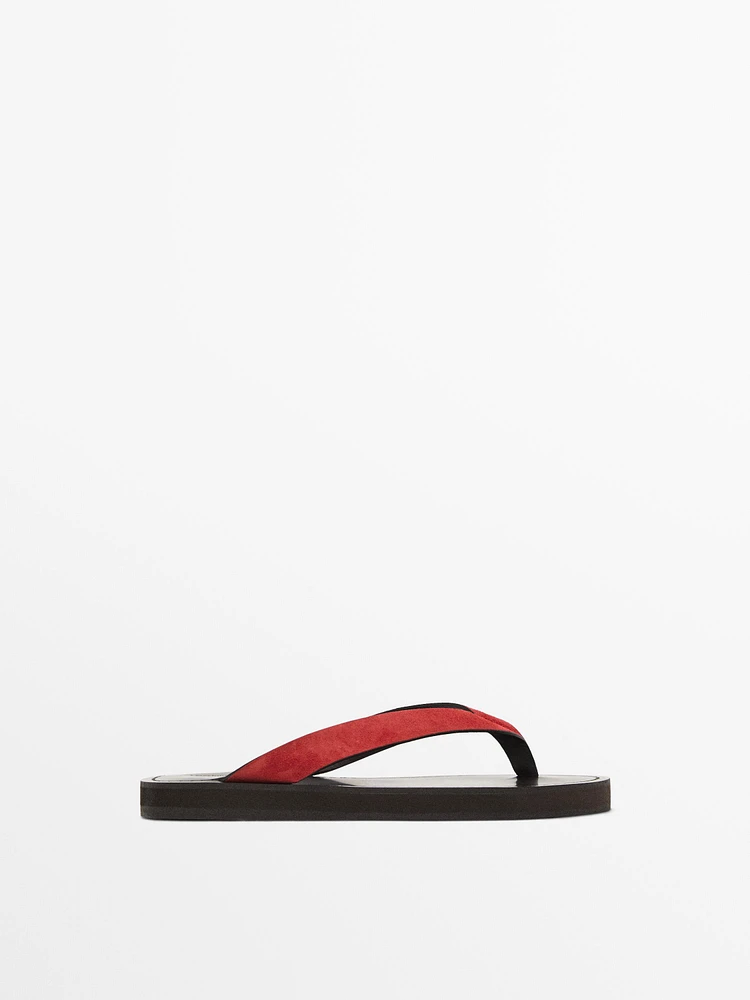 Split suede sandals with toe divider