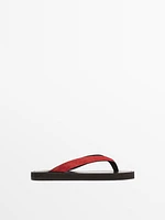 Split suede sandals with toe divider
