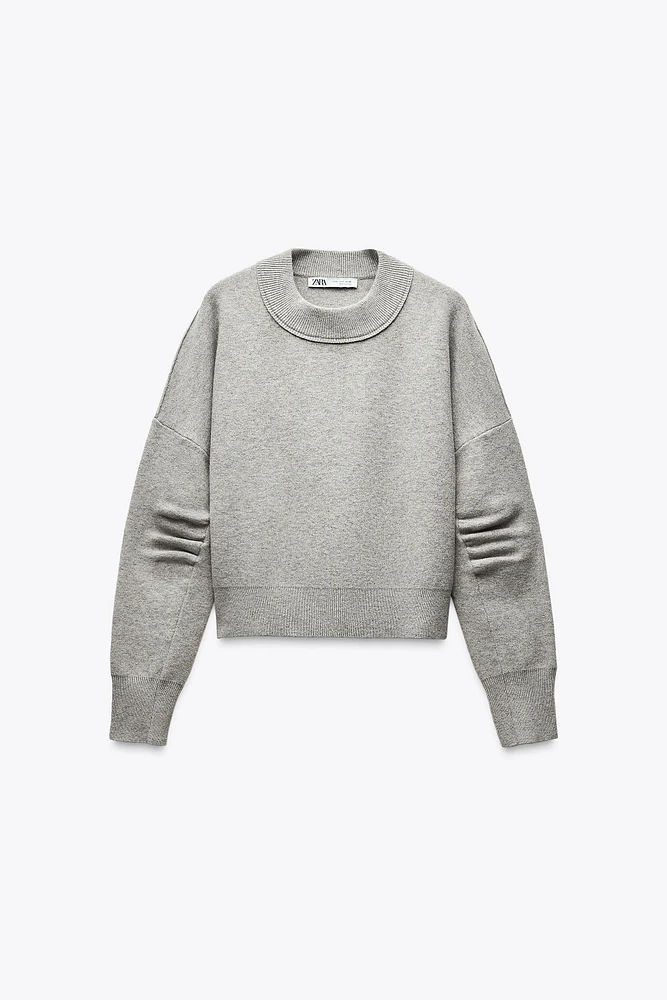 PLEATED SLEEVE SWEATSHIRT
