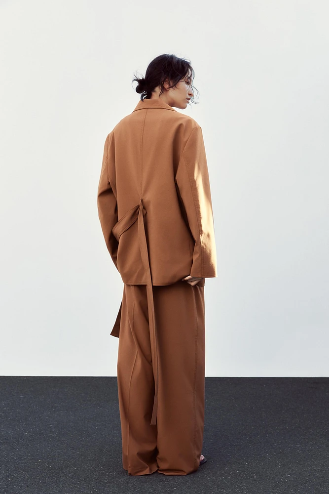 VESTE OVERSIZE À CEINTURE
