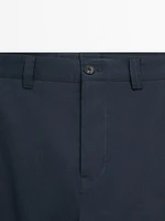 Slim fit cotton blend trousers.