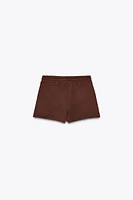 THE WHITE LOTUS FLEECE SHORTS