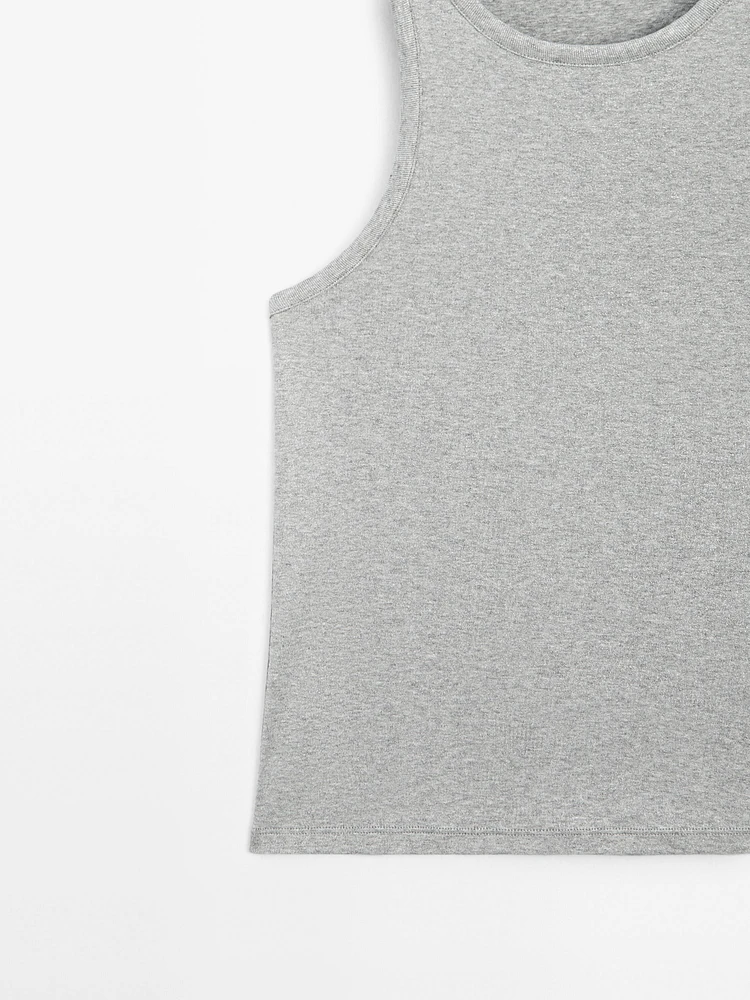 Round neck top with shimmery detail