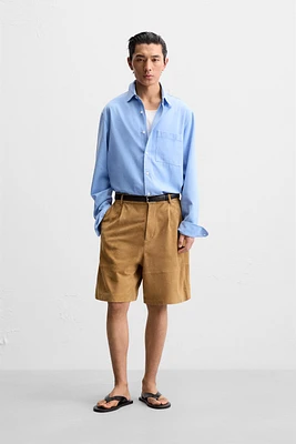 PLEATED SUEDE SHORTS