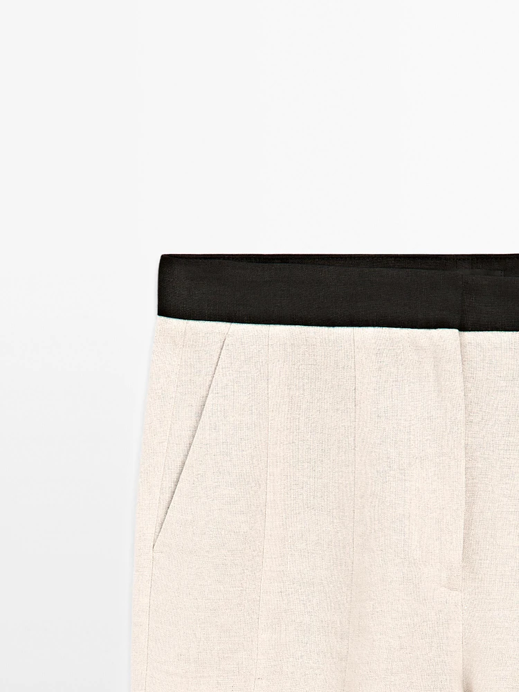 Pantalon flare taille contrastante