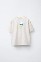 RAISED GRAPHIC T-SHIRT