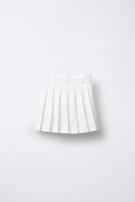PLEATED SKIRT WITH HEART APPLIQUÉ