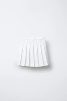 PLEATED SKIRT WITH HEART APPLIQUÉ