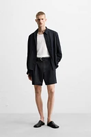 PLEATED BELT BERMUDA SHORTS
